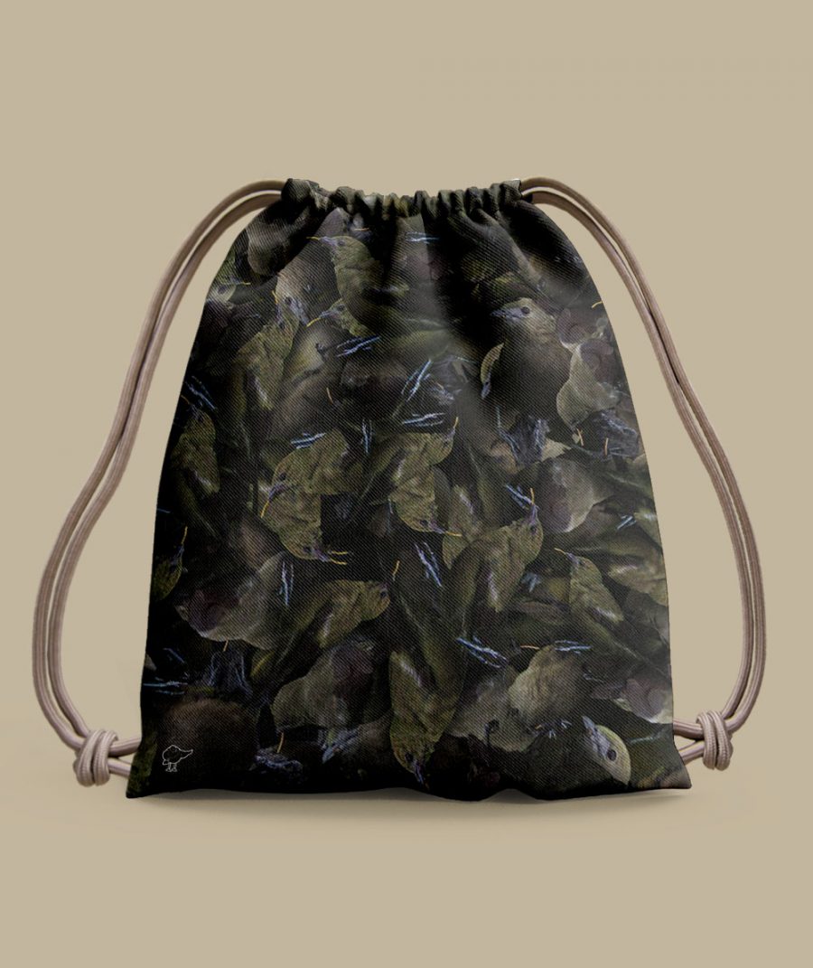 Tula en lona impermeable estampado Tángara de Palmera